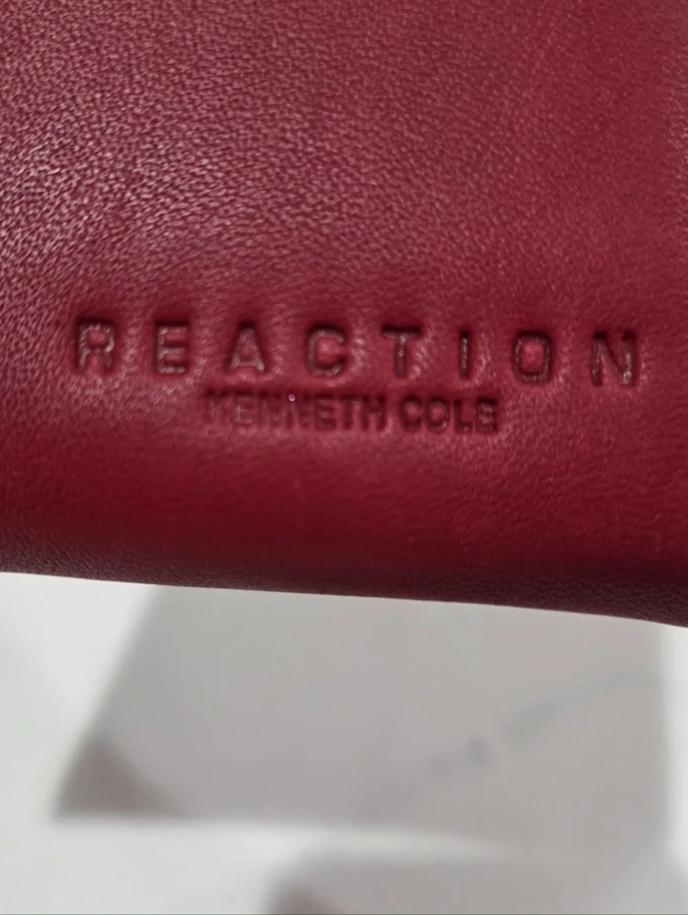 Kenneth Cole Reaction cranberry red crossbody bag